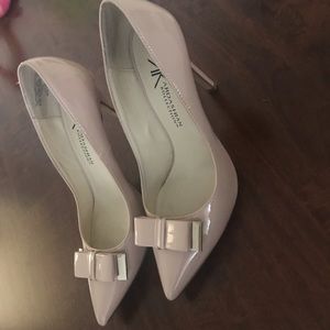 Nude high heels lightly used